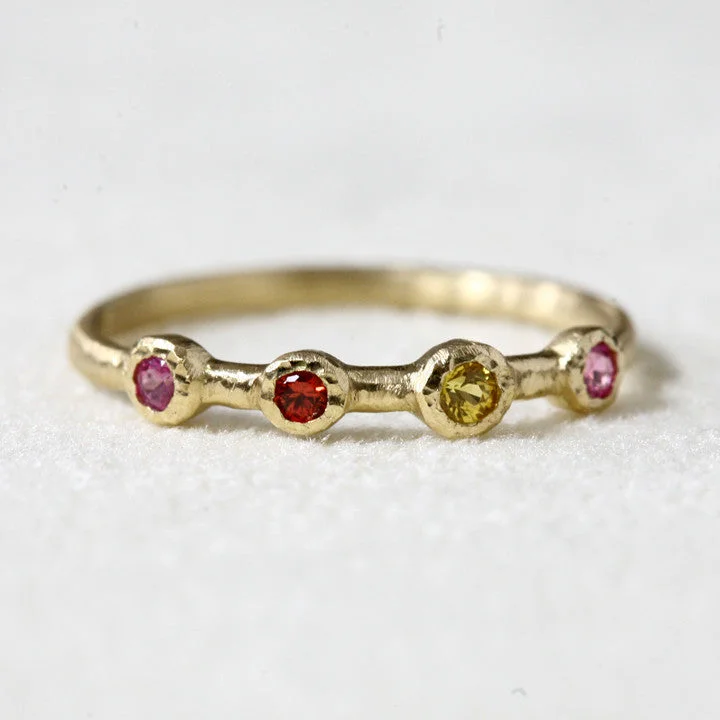 Multi sapphire 4 bezel ring