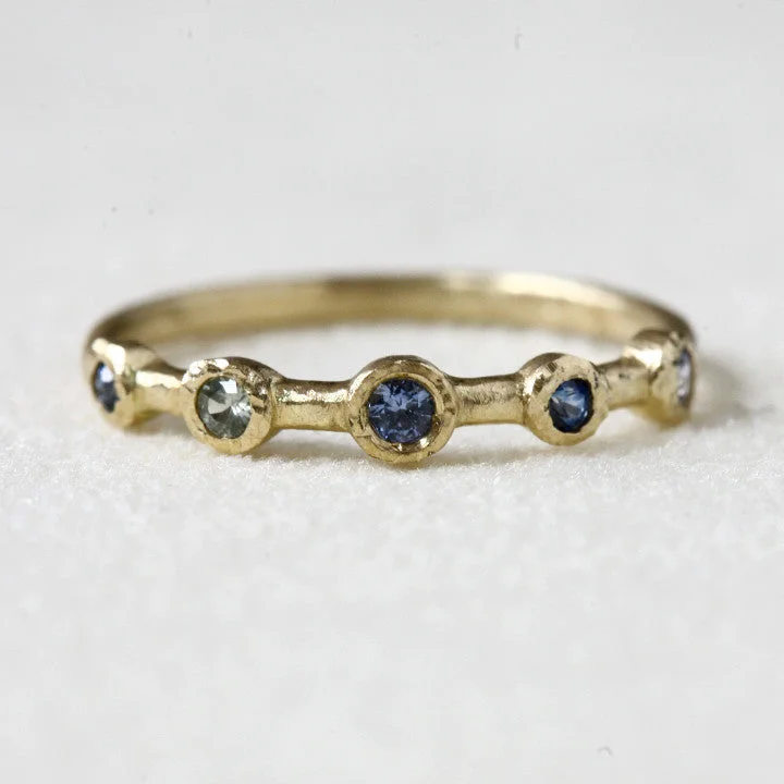 Multi sapphire 5 bezel ring