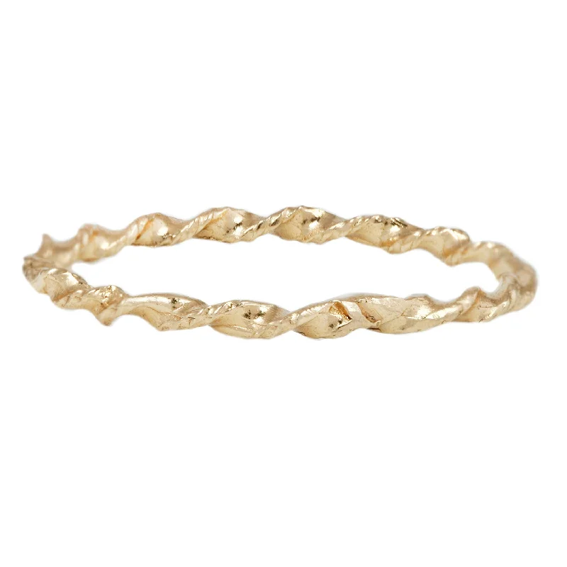 LXXXII Twist Gold Band